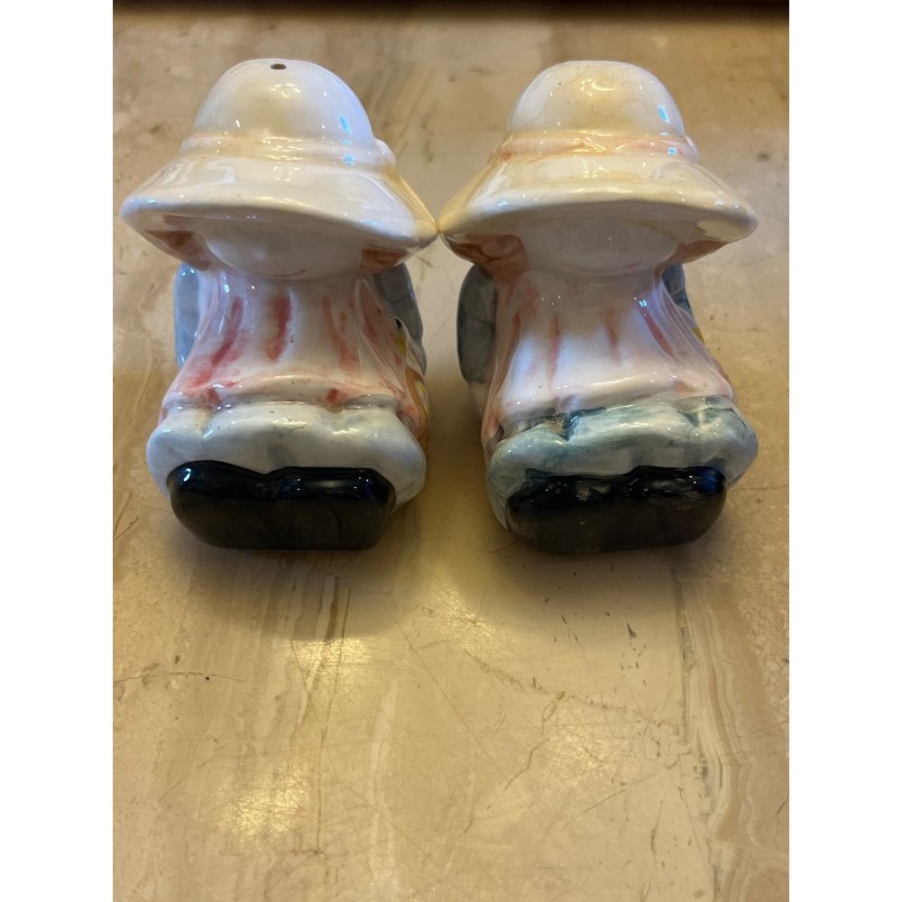 Vintage 3" Salt & Pepper shakers Child wearing bonnet with basket of flowers.
